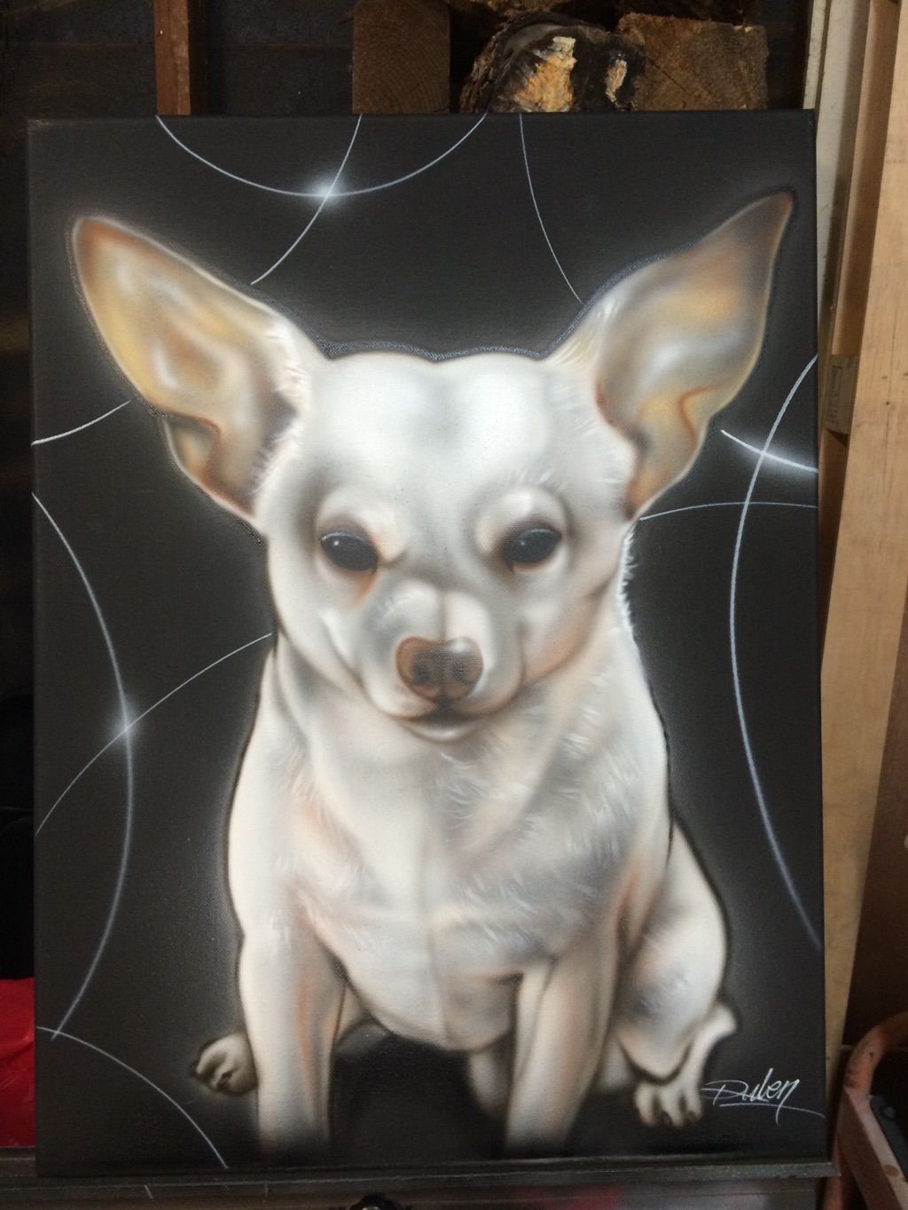 An airbrushed portrait of a white chihuahua with large ears, sitting against a black background crossed by thin white swirls.
